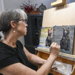 DeAnn Meely works in her Bank Street studio on some of the pieces inspired by a recent trip to Alaska. [JERONIMO NISA]