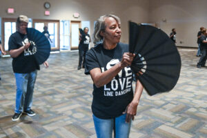Delores Matthews, front, and other Soulful Shakers line dance at Turner-Surles Community Center during one of their recent meetings.