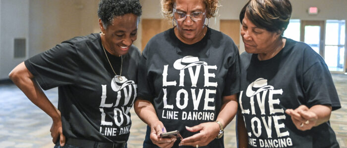 Soulful Shakers members Janetia Owens, left, Carolyn Stevenson, center, and Bertha Webb check out some dance moves in a video.