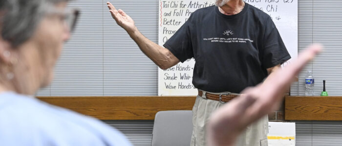Sid Braunstein leads a tai chi class at Decatur Public Library.