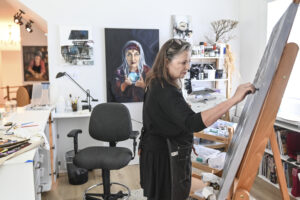 Char Baxter works in her home studio.