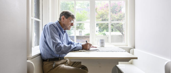 Harry Moore says he often jots down his ideas, verses and drafts in a journal while sipping his morning coffee