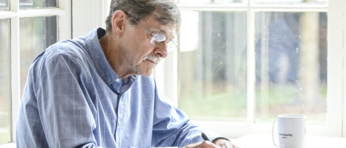 Harry Moore says he often jots down his ideas, verses and drafts in a journal while sipping his morning coffee