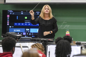 Regina Raney leads the Austin Junior High School band’s morning practice. [JERONIMO NISA]